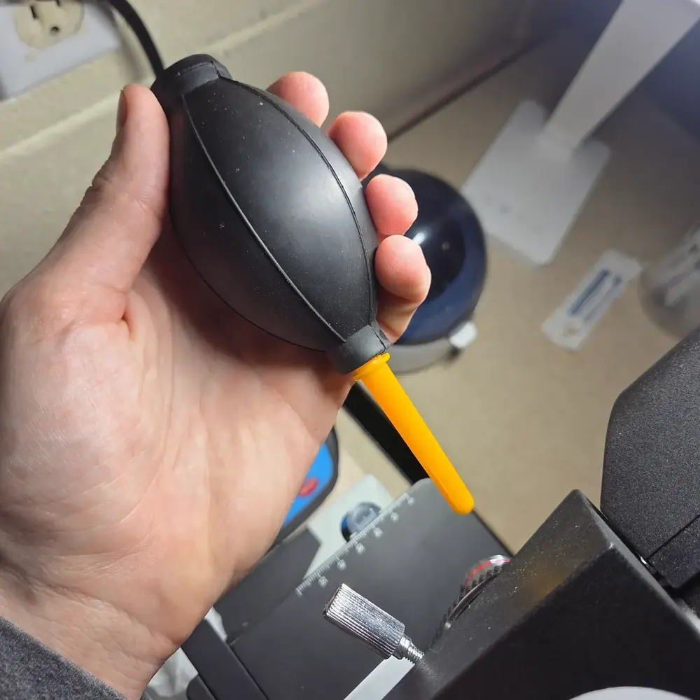 Rubber lens dust blower in my hand